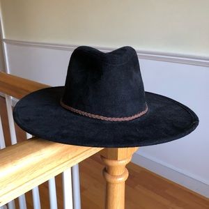 Wide brimmed black hat